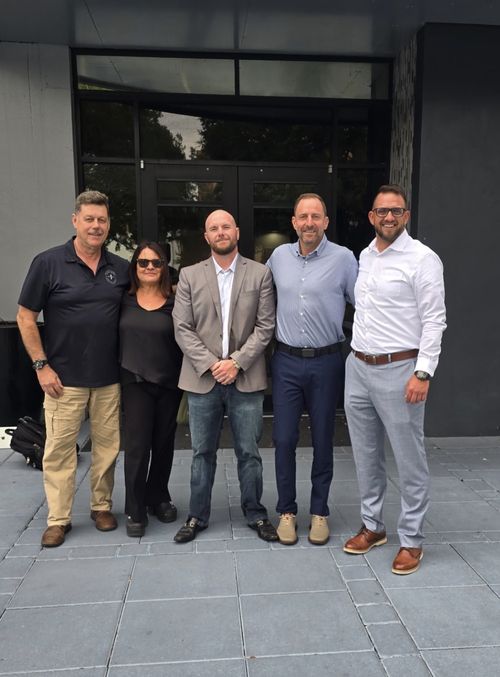 Zach Knight with colleagues